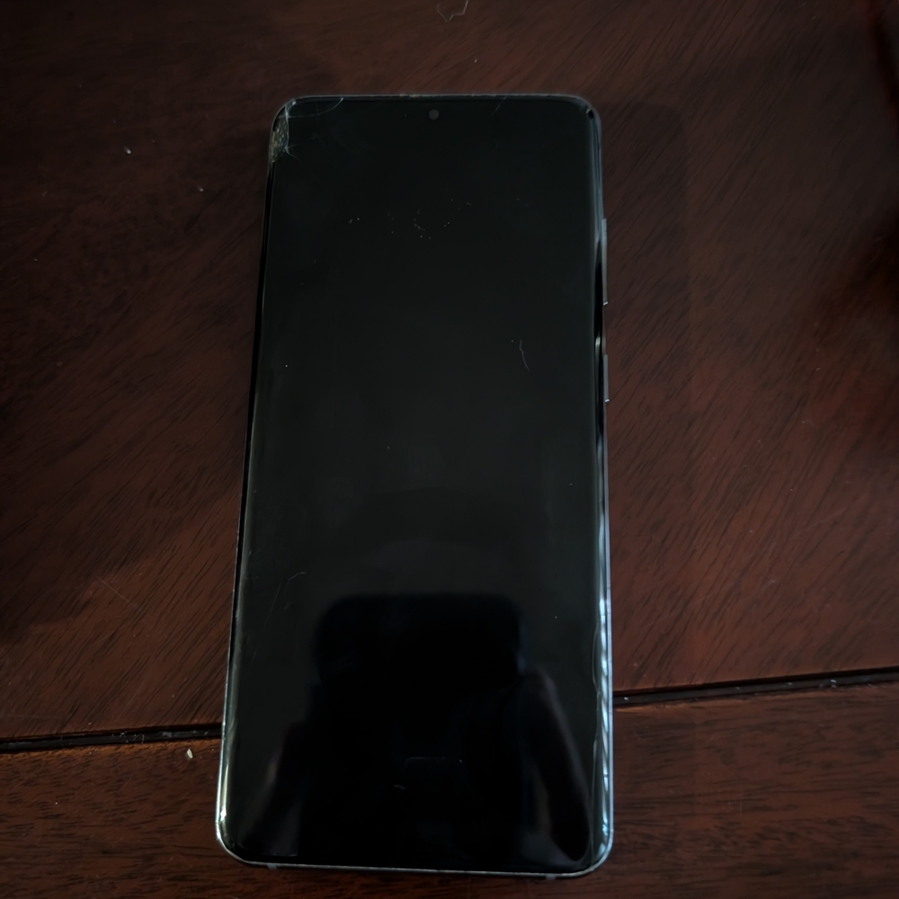 Black Smartphone with Slight Corner Damage